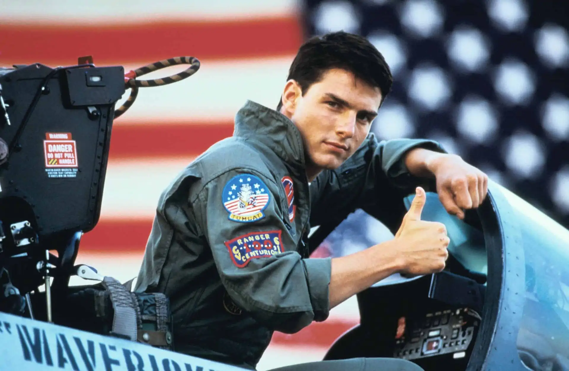 Top gun actor giving a thumbs up from his fighter jet.