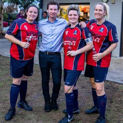 Me with The Lakes FC City 4 womens players celebrating after their undefeated season.